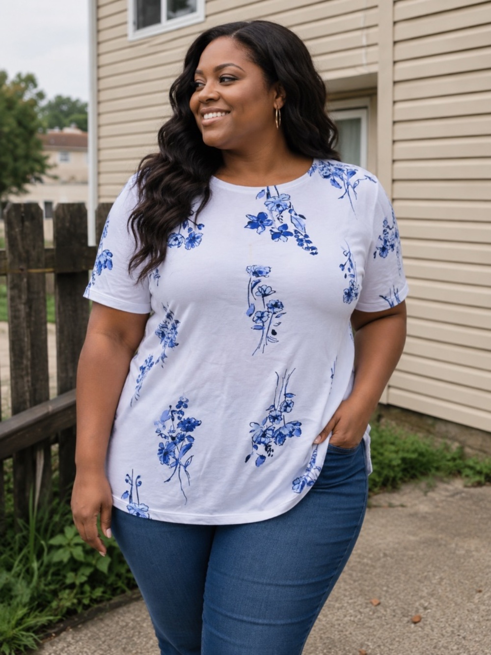 A blue and white round neck, short sleeve top